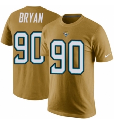NFL Men's Nike Jacksonville Jaguars #90 Taven Bryan Gold Rush Pride Name & Number T-Shirt